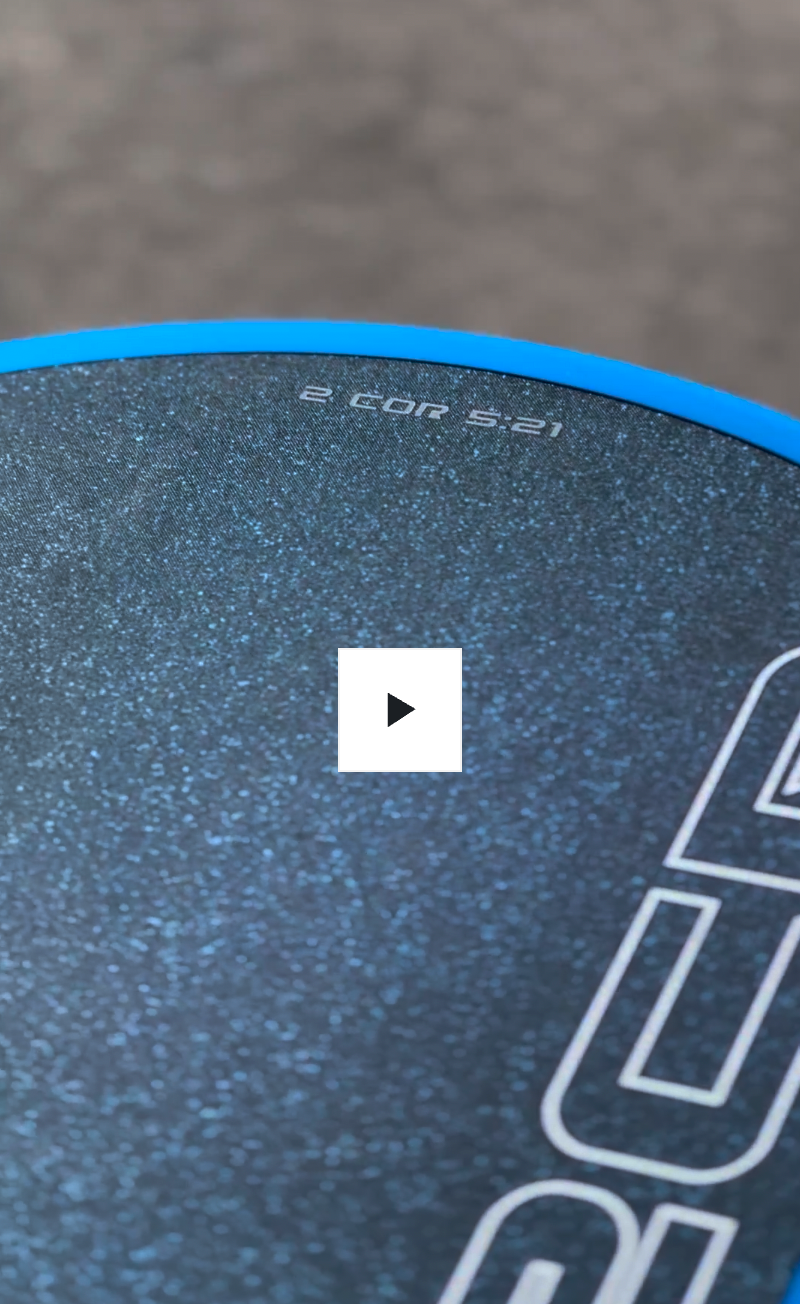 Close-up of Crystal Blue Endurance Surface™ on Honolulu J2CR pickleball paddle – long-lasting spin and durability grit