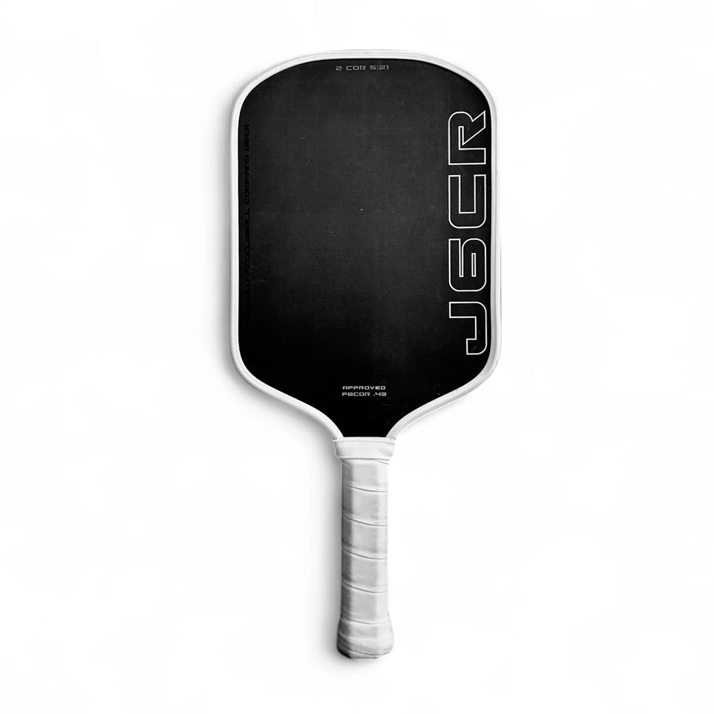 Close-up of carbon fiber surface on Honolulu J6CR pickleball paddle – gritty spin and Core Reactor™ detail