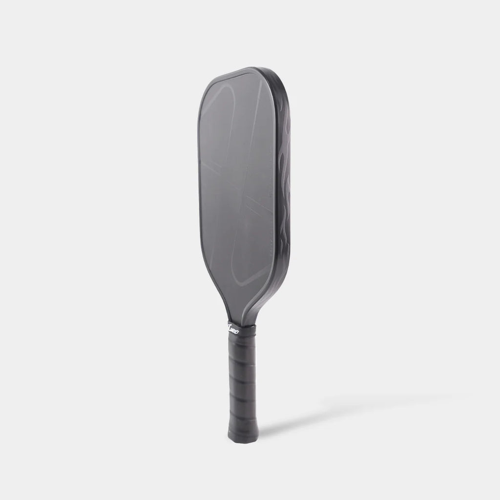 Side angle of LUZZ Pro 4 Darkness Inferno 16mm paddle showing elongated shape and grip